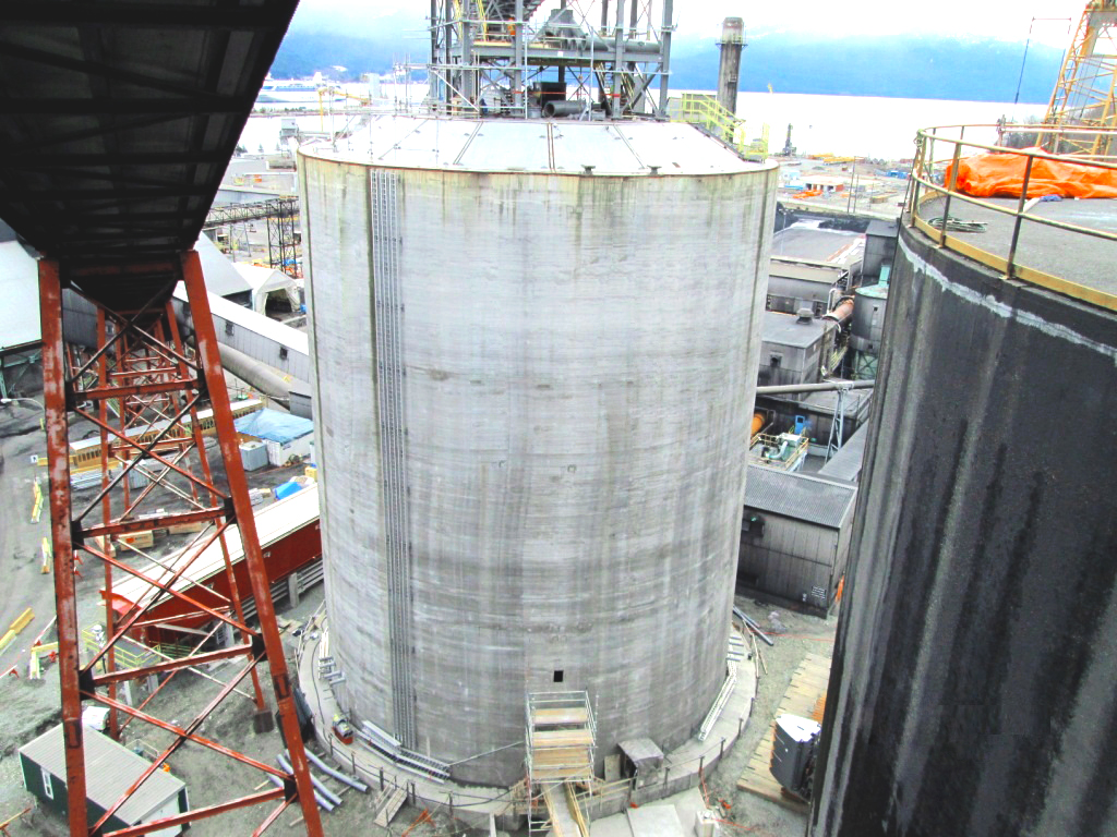 Kitimat 20,000 tonne concrete slipform silo alumina storage Ag-industrial Bulk material handling Mining Kitimat Slipform concrete silos Design-build